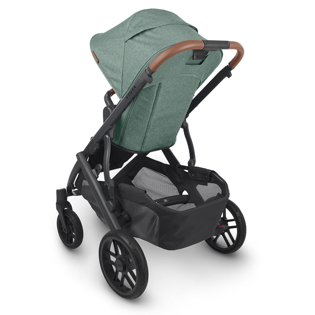 Rear-view of the uppababy vista v2 stroller showing the ample storage basket and leatherette handlebar details -- Color_Gwen