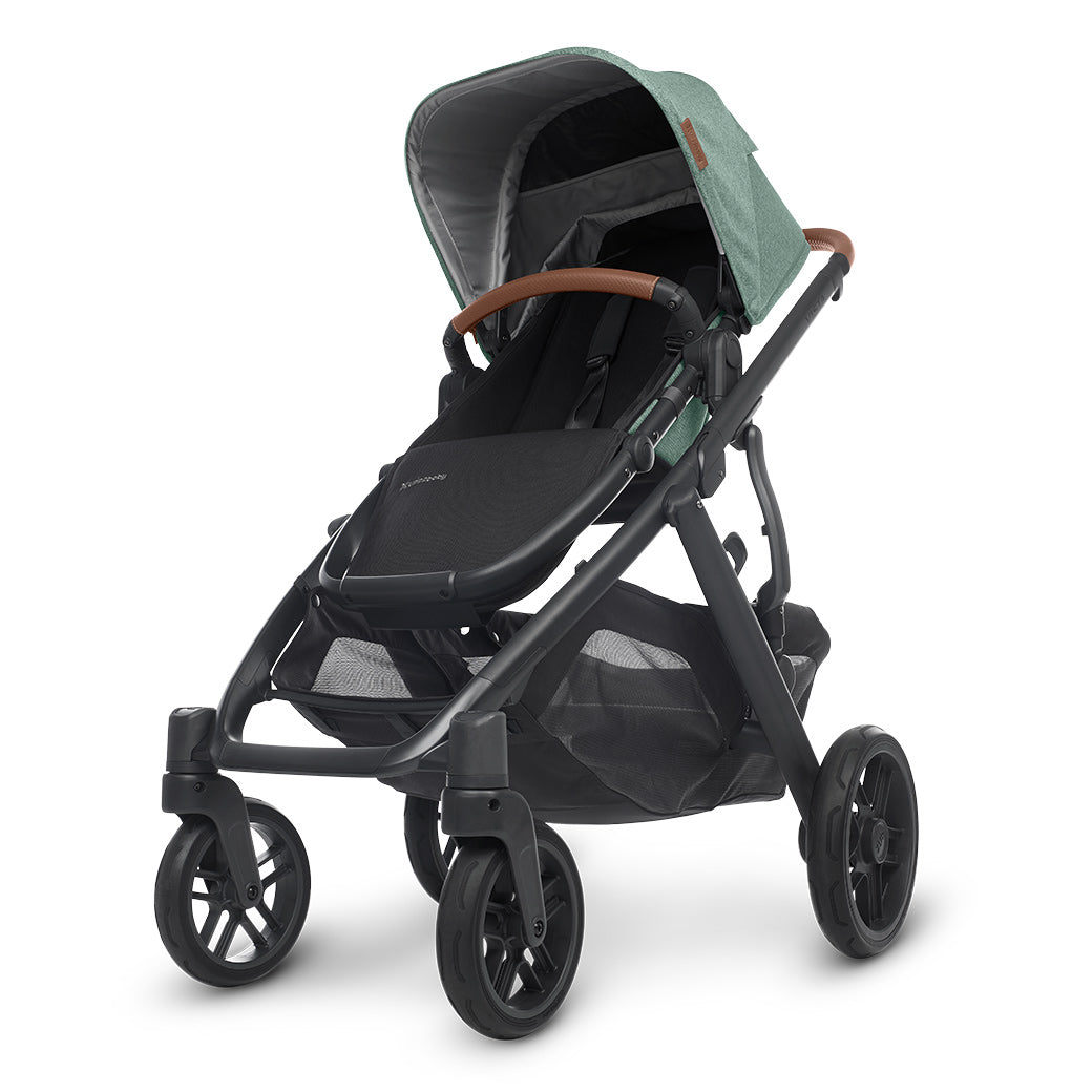 The half extended sunshade on right side view of the uppababy vista v2 stroller -- Color_Gwen
