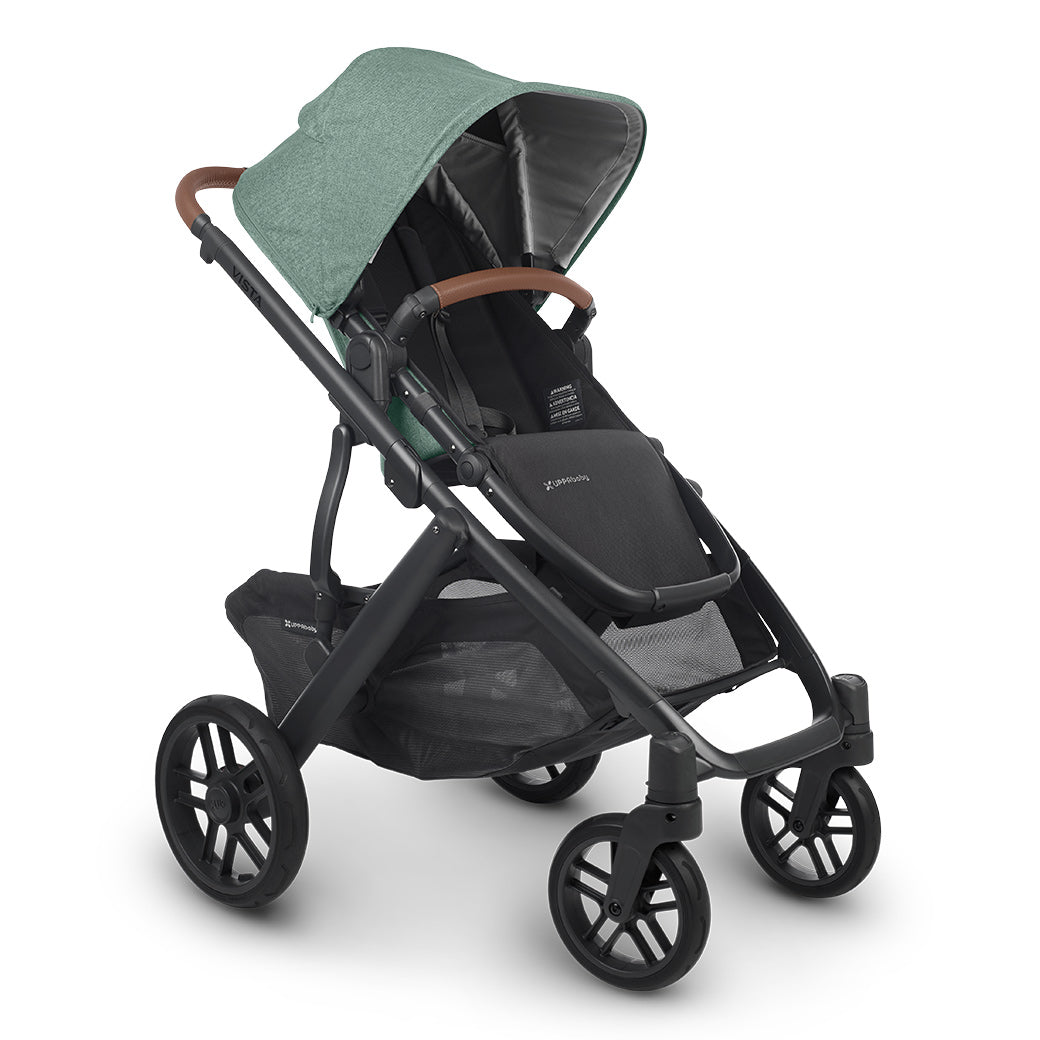 The half extended sunshade on the left side view of uppababy vista v2 stroller -- Color_Gwen