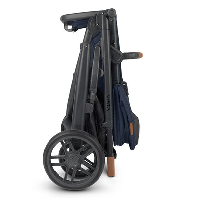 Folded UPPAbaby VISTA V2 Travel System stroller in -- Color_Noa