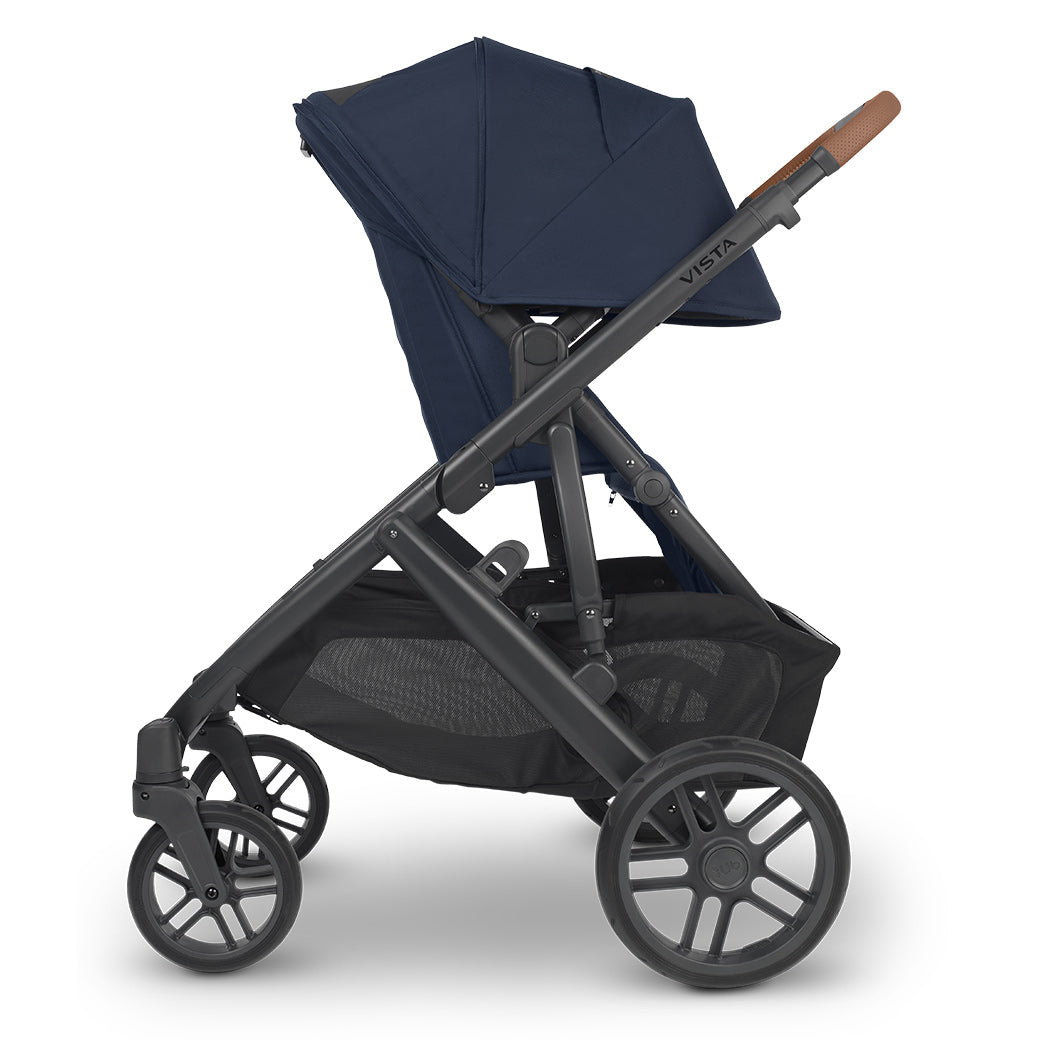 Rear-facing configuration of the stroller seat on the extended sunshade of the UPPAbaby Vista v2 stroller in -- Color_Noa