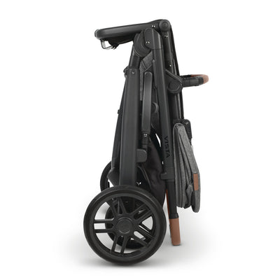 Folded UPPAbaby VISTA V2 Travel System stroller in -- Color_Greyson