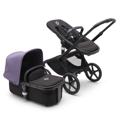Bugaboo Fox 5 Stroller with a toddler seat and the bassinet on the side in -- Color_Astro Purple