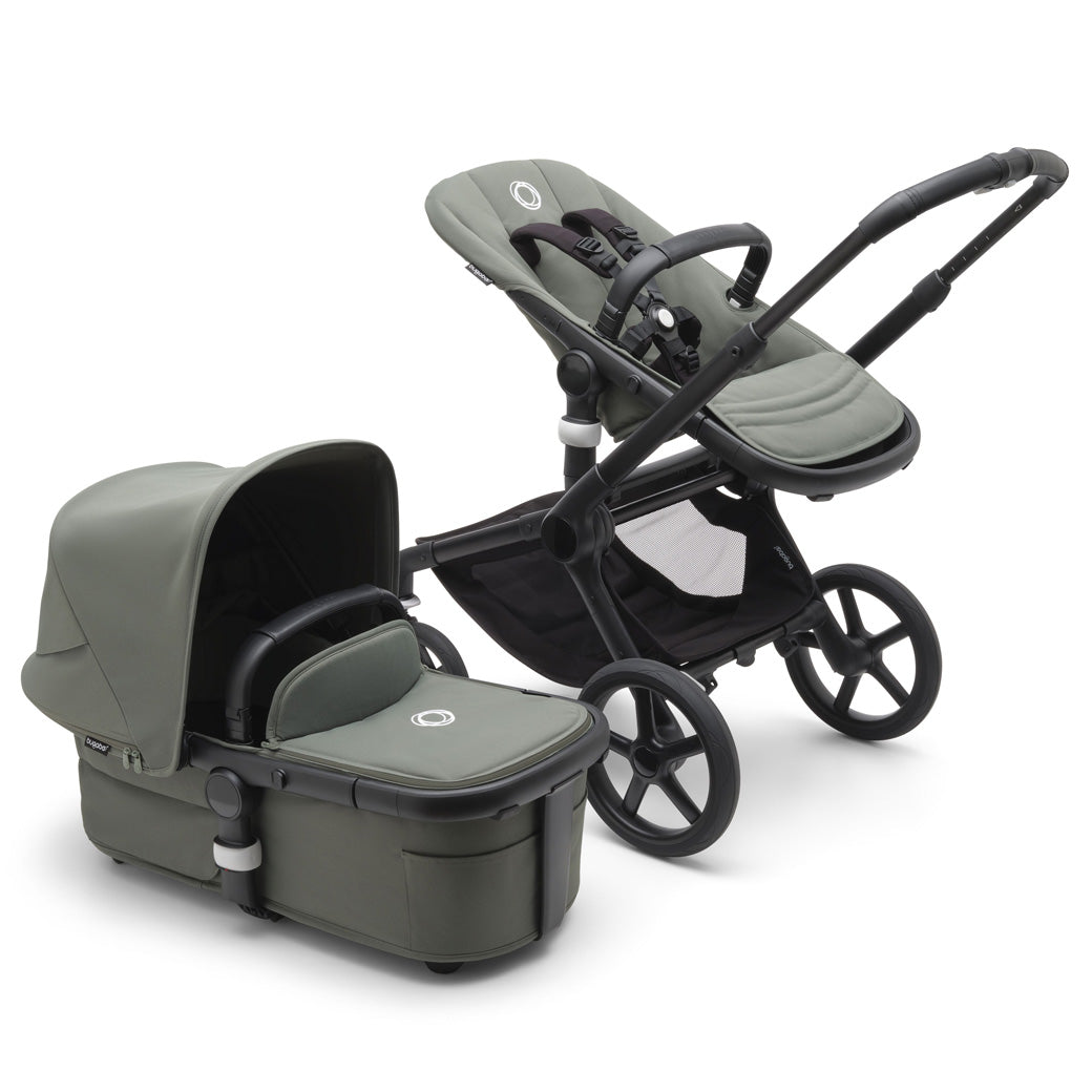 Bugaboo Fox 5 Stroller with a toddler seat and the bassinet on the side in -- Color_Forest Green