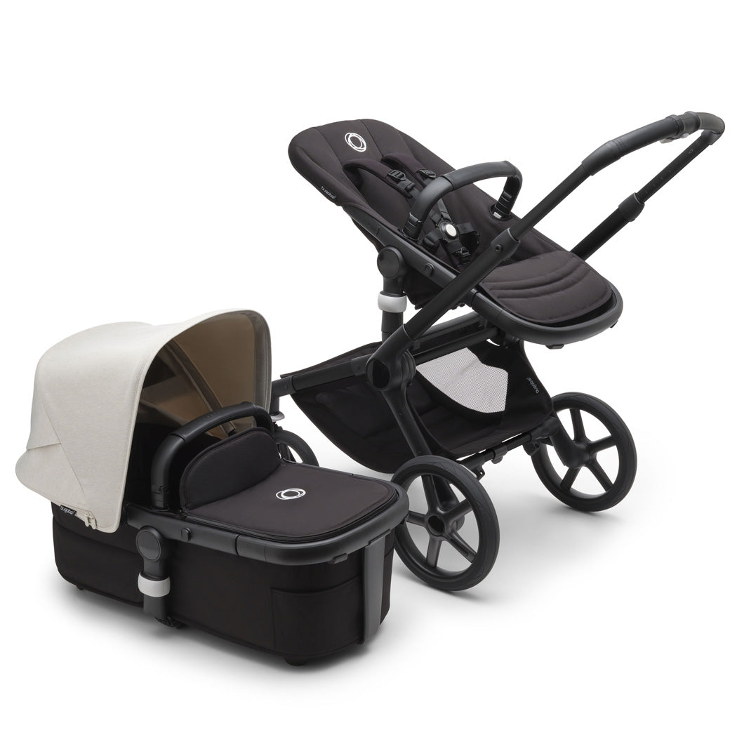Bugaboo Fox 5 Stroller with a toddler seat and the bassinet on the side in -- Color_Misty White