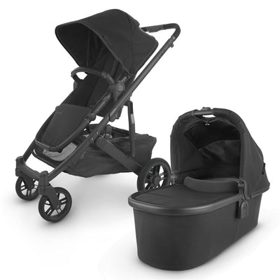 The all-new UPPAbaby CRUZ V2 in black accommpanied by its matching bassinet -- Color_Jake