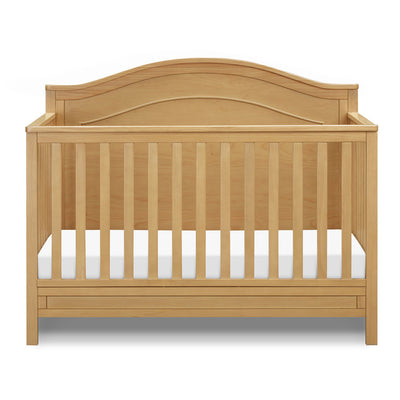 Front view of The DaVinci Charlie 4-in-1 Convertible Crib in -- Color_Honey