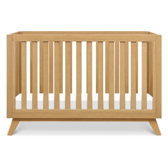 Front view of DaVinci Otto 3-in-1 Convertible Crib in -- Color_Honey _ Wood