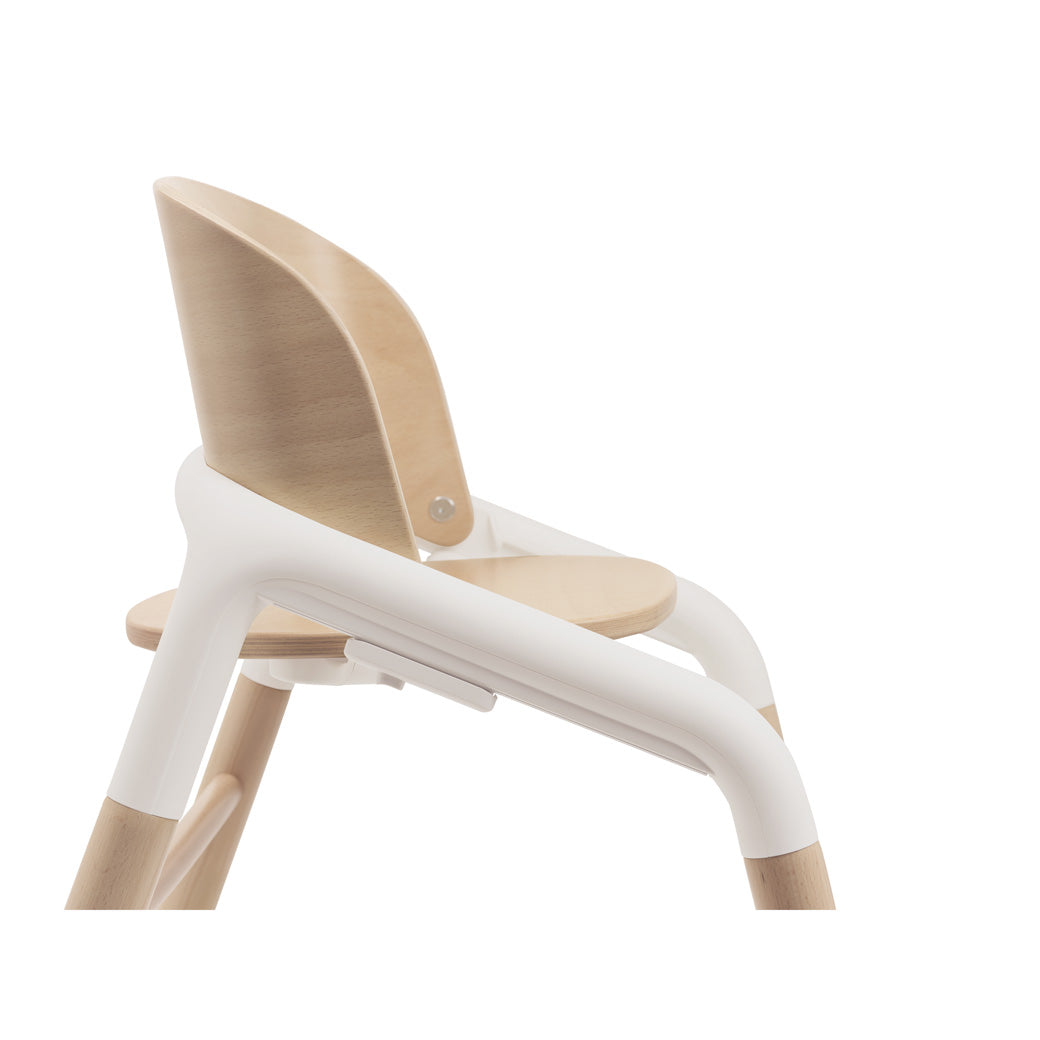 Side view closeup of Bugaboo Giraffe High Chair in --Color_Neutral Wood / White