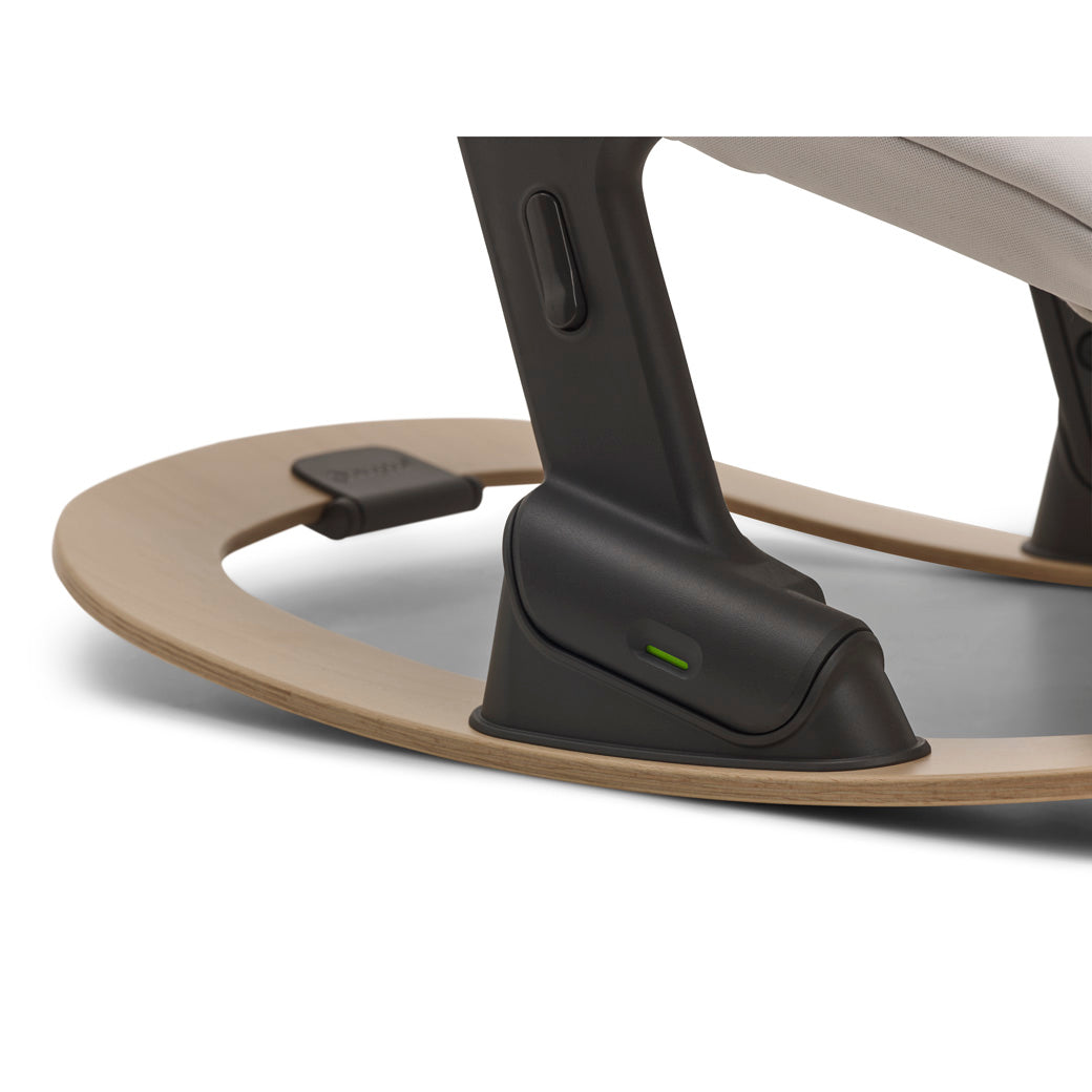 Close up of legs and Bugaboo Giraffe Rocker Frame in --Color_Natural Wood