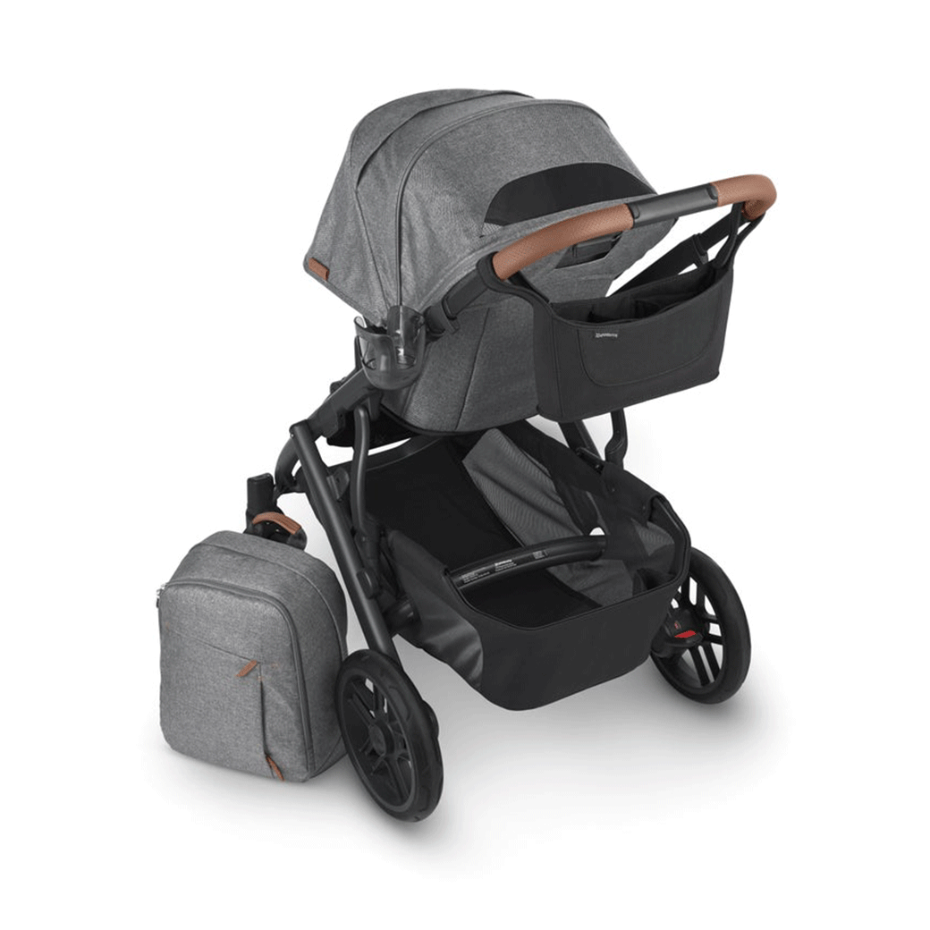 UPPAbaby Changing Backpack next to a UPPAbaby stroller  in -- Color_Gregory