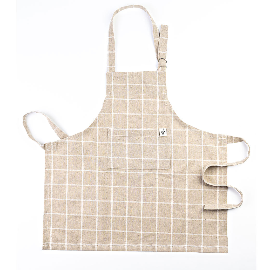 Front view of Milton & Goose Kid's Apron in -- Color_Tan