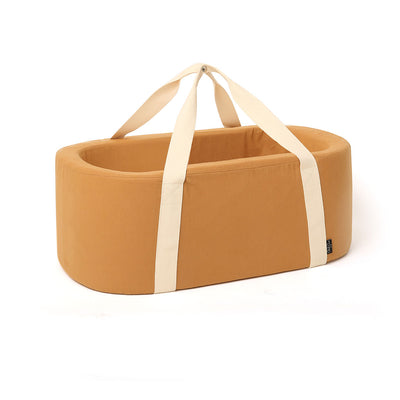 Charlie Crane KUKO Moses Basket with handles up in -- Color_Camel Organic Cotton