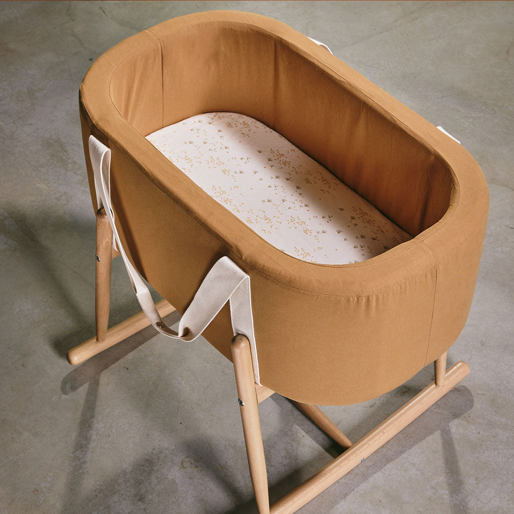 Upper view of Charlie Crane KUKO Moses Basket in -- Color_Camel Organic Cotton