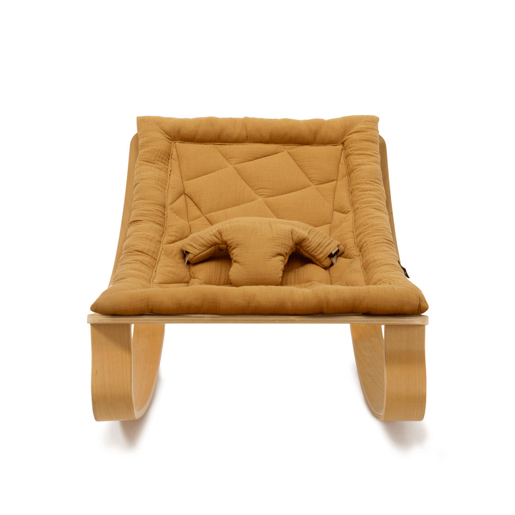 Front view of the Charlie Crane LEVO Baby Rocker in -- Color_Camel _ Beech