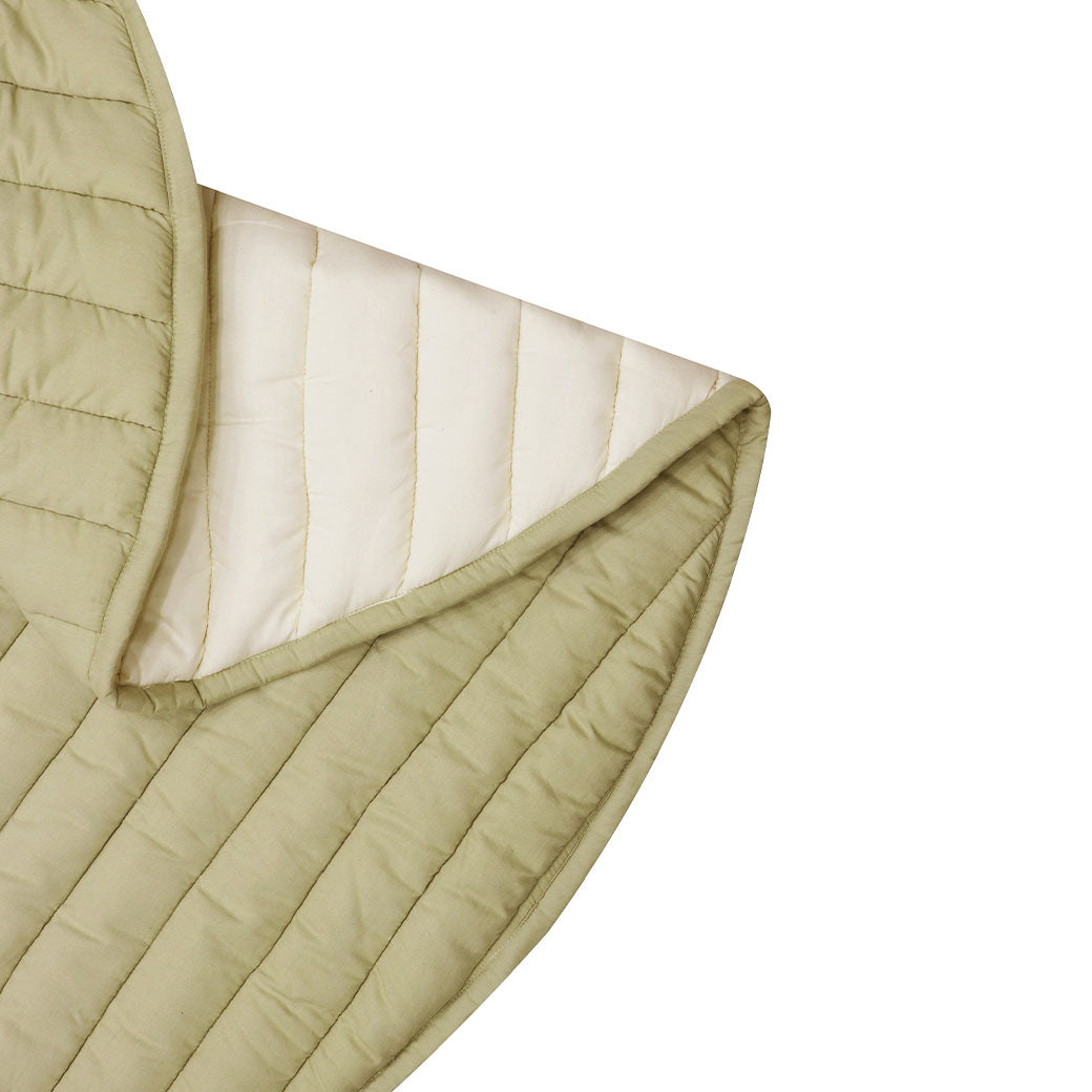Folded view of Lorena Canals Products Bamboo Leaf Playmat