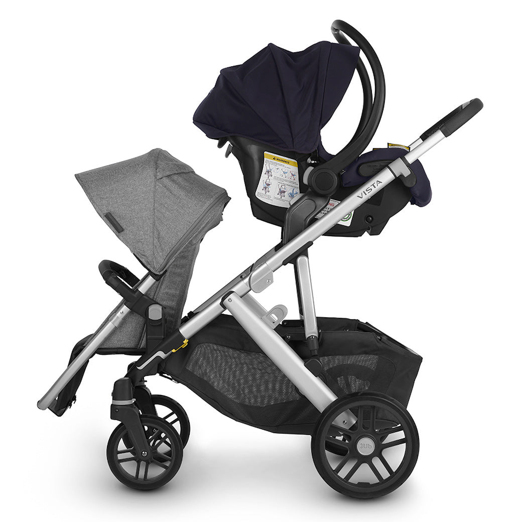 Side view of UPPAbaby Car Seat Adapters on a double stroller 