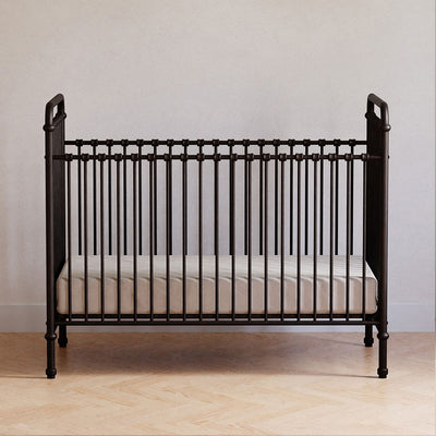 Front view of Namesake`s Abigail 3 in 1 Crib in a room in -- Color_Vintage Iron