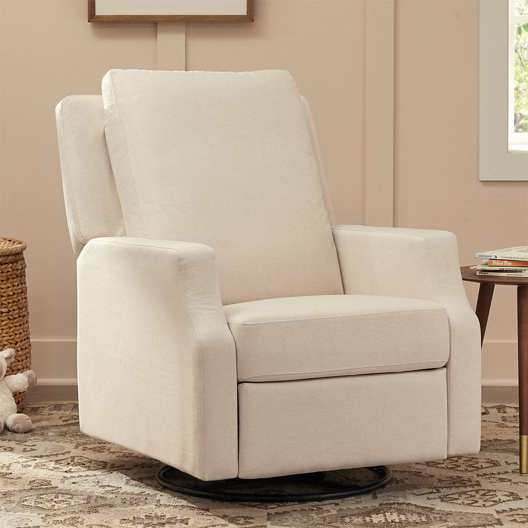 Namesake's Crewe Recliner & Swivel Glider  next to a side table in -- Color_ Performance Cream Eco-Weave With Metal Base