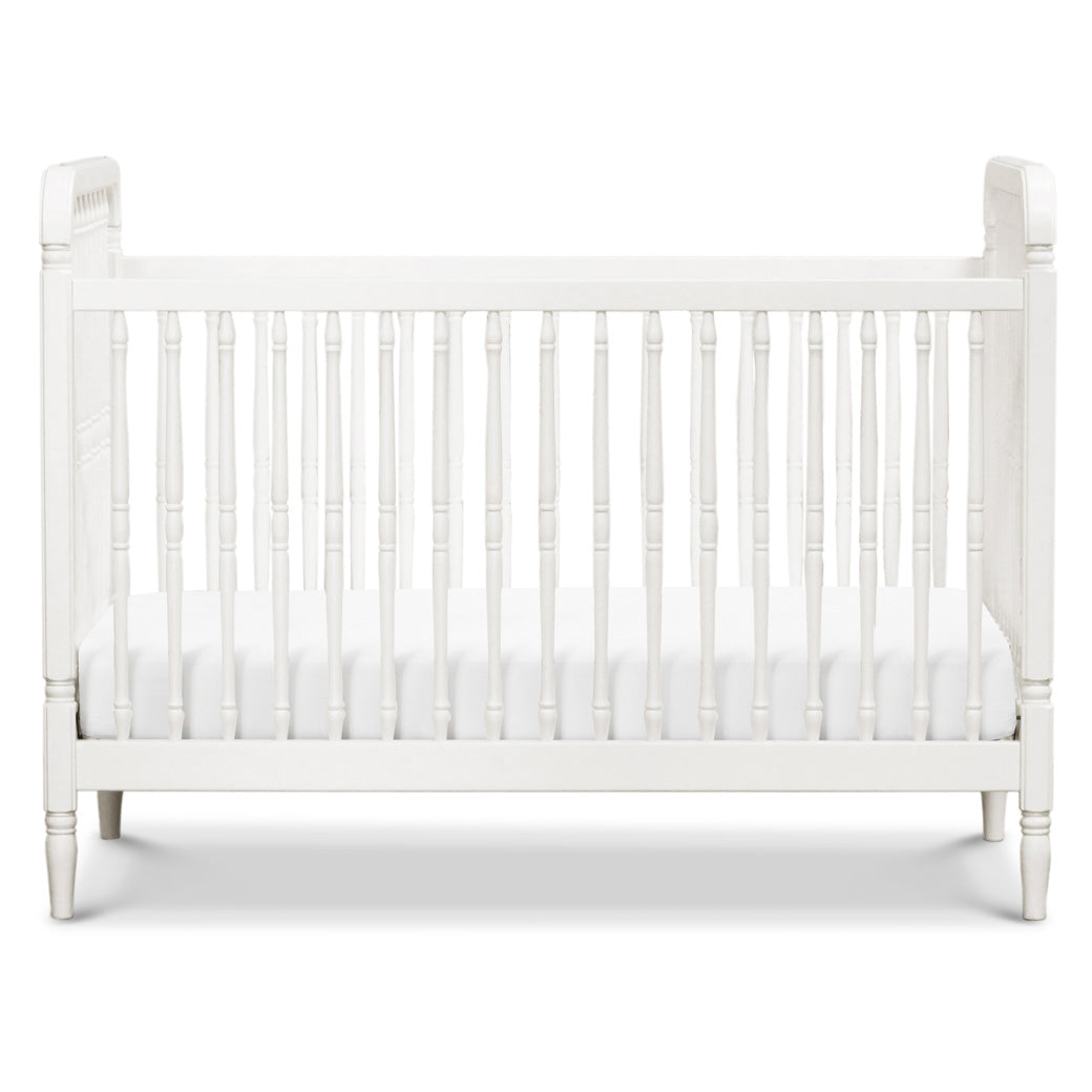 Front view of The Namesake Liberty 3-in-1 Convertible Spindle Crib in -- Color_Warm White