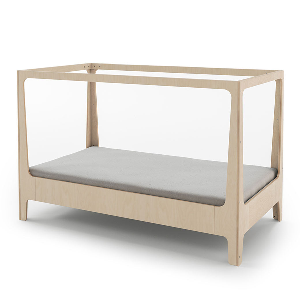 Oeuf Perch Nest Bed configured as a canopy bed