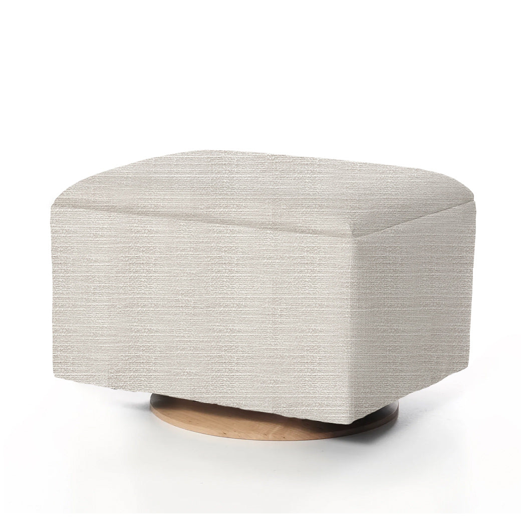 Dark brown boucle ottoman with round wooden base.