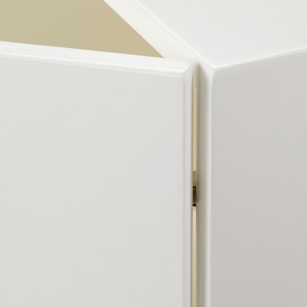 Corner closeup of Milton & Goose Terry Cabinet in -- Color_White