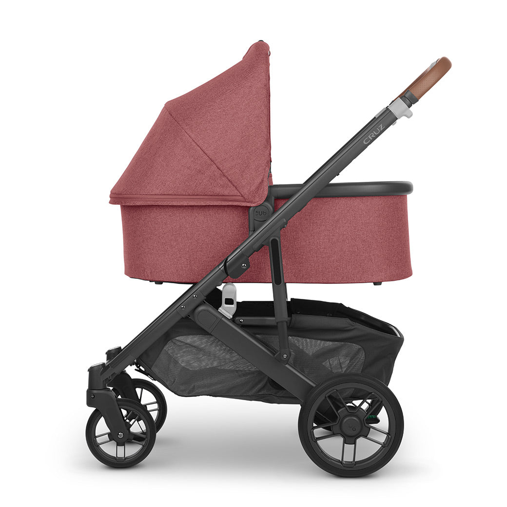 Side view of UPPAbaby Bassinet on a stroller in -- Color_Lucy