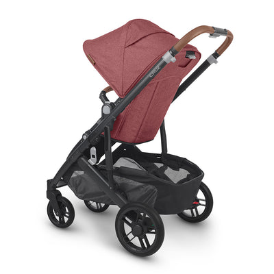 Angled back view of UPPAbaby CRUZ V2 Stroller in -- Color_Lucy