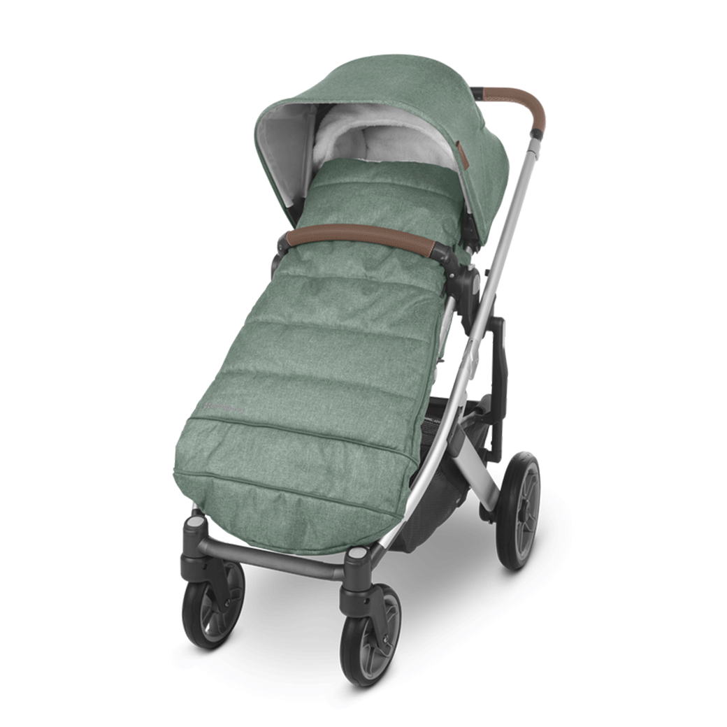 the ultra-plush CozyGanoosh footmuff putting on the green stroller -- Color_Emmett