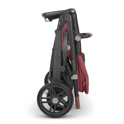 Folded UPPAbaby VISTA V2 Travel System stroller in -- Color_Lucy