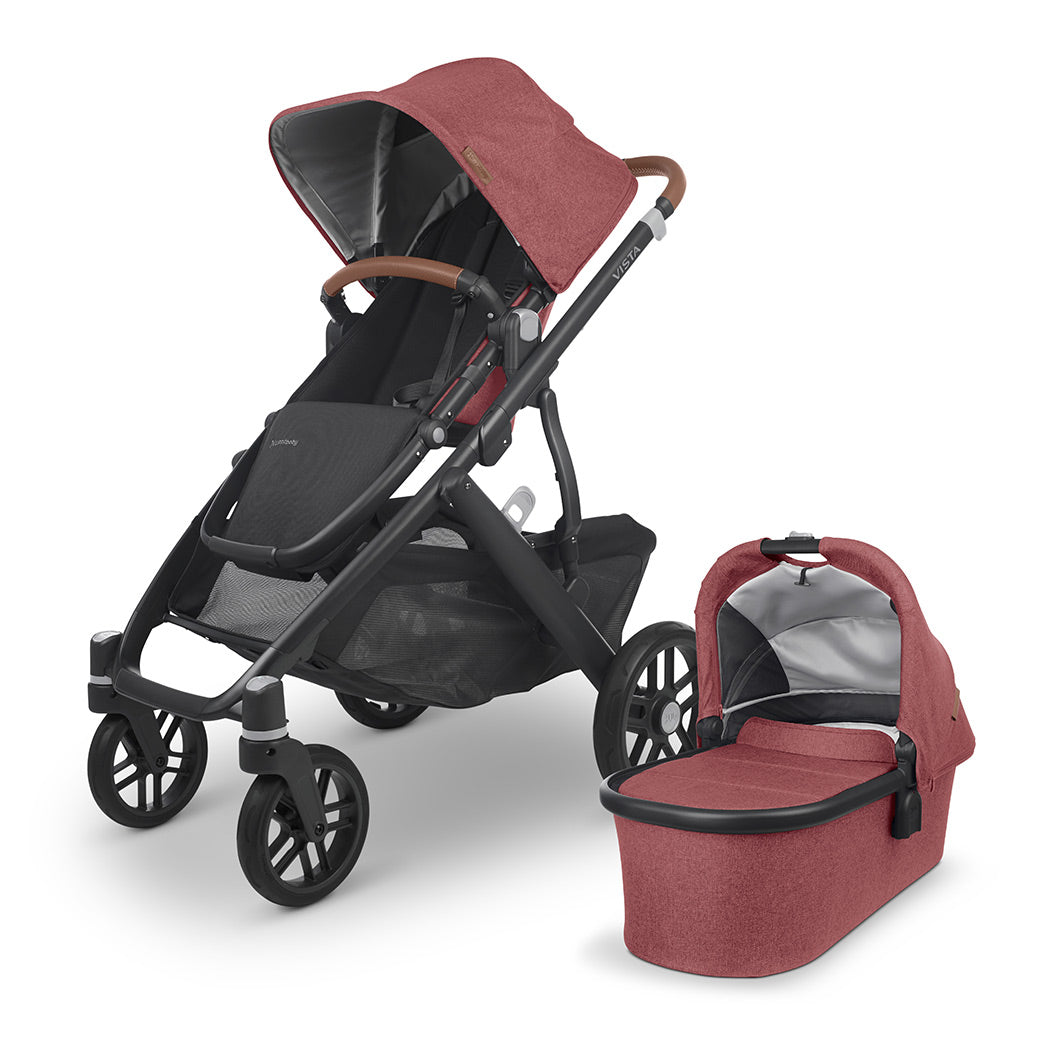 The all-new UPPAbaby VISTA v2 in rustic red accommpanied by its matching bassinet -- Color_Lucy