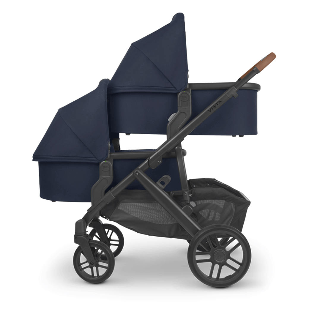 Side view of UPPAbaby Vista V2 Twin Stroller with two bassinets in -- Color_Noa